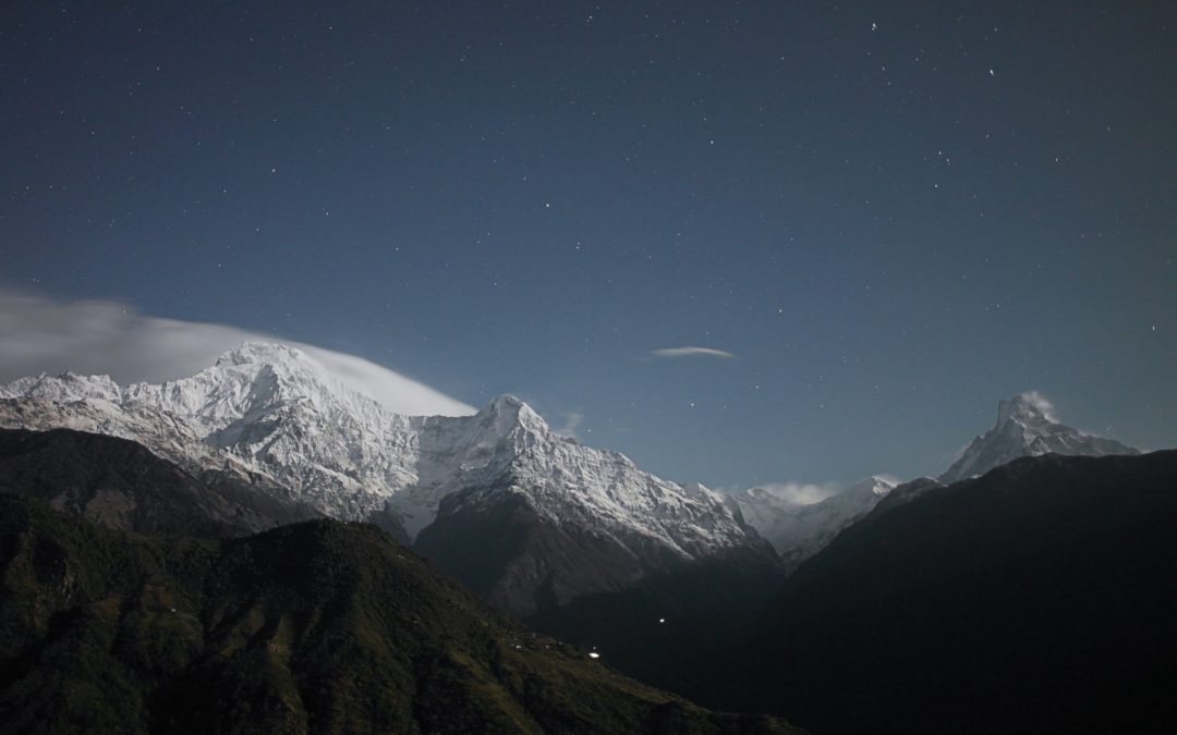 A mountain range with snow on top of it.
