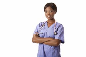 A woman in scrubs with her arms crossed.